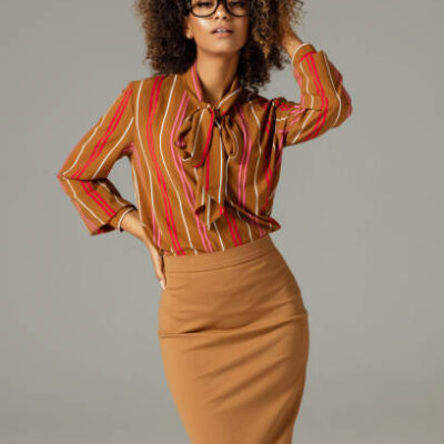 Photo of black woman wear glasses and looking at camera